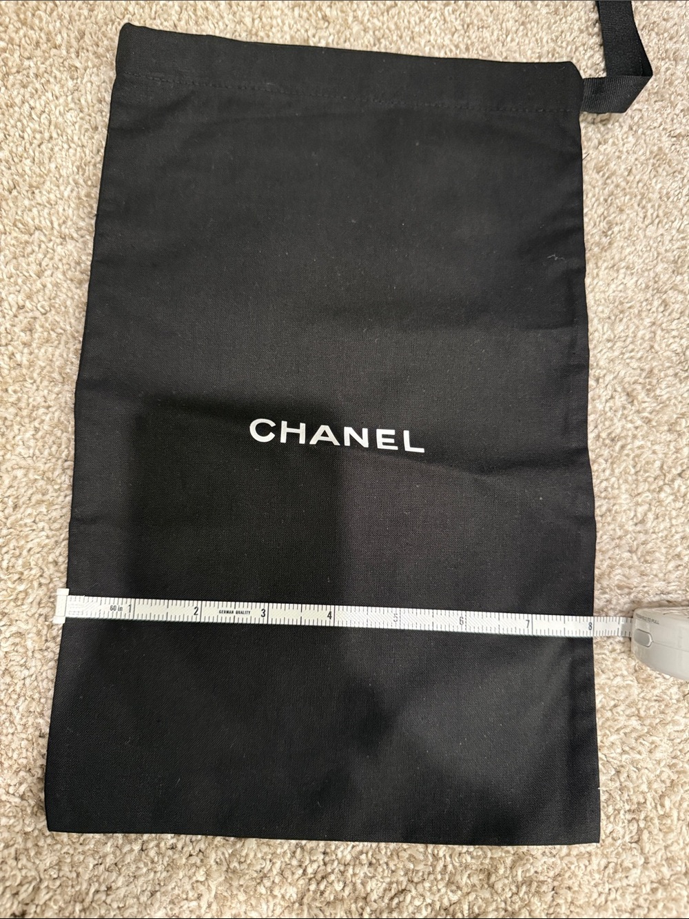 CHANEL Black Drawstring Pouch with White Logo